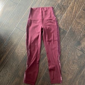 Lululemon Align leggings with velvet side stripe. Color is maroon.